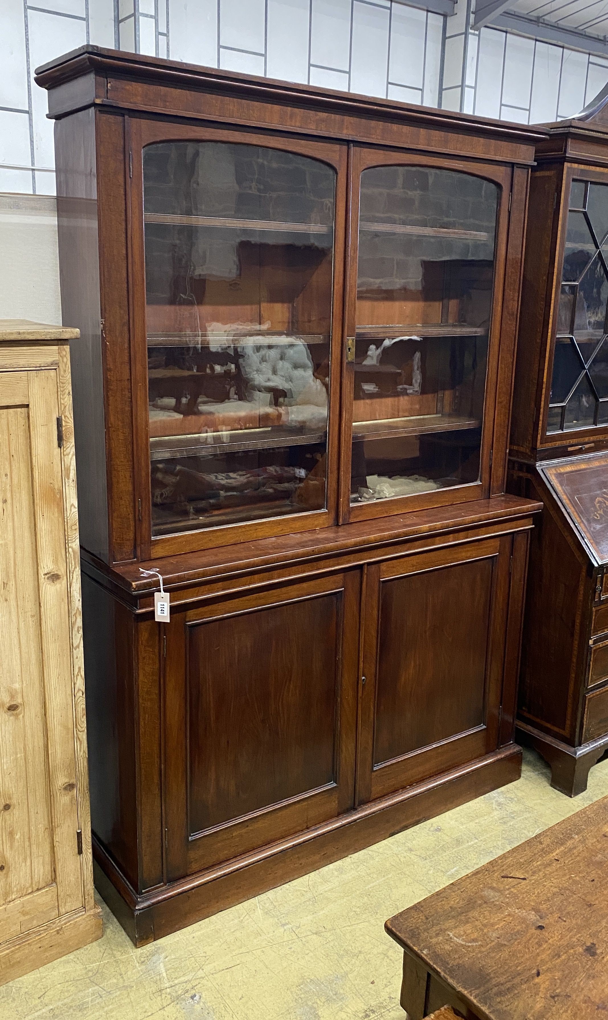 A Victorian mahogany library bookcase, length 140cm, depth 38cm, height 209cm